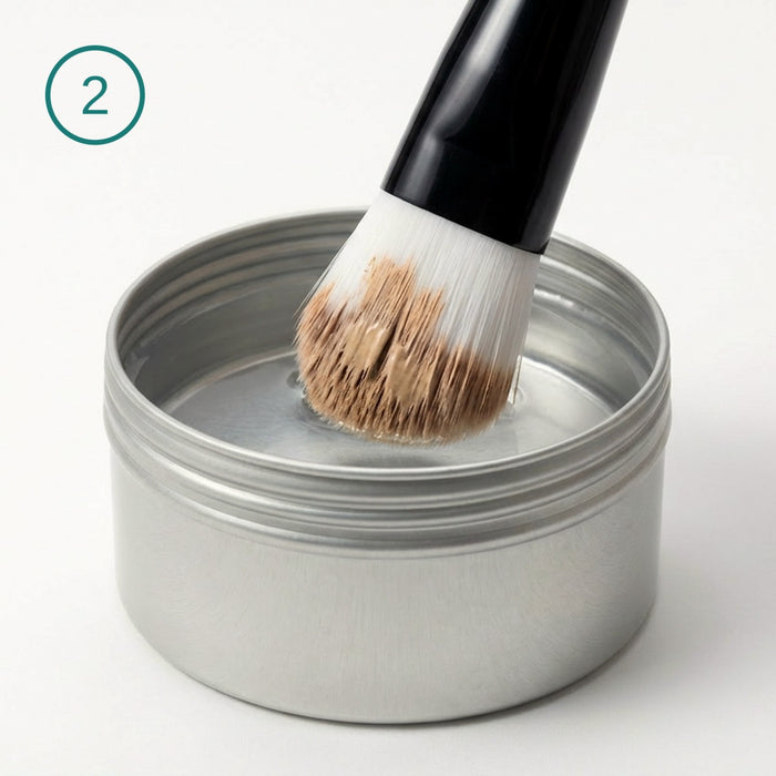 Dip just the tip of the brush. 1–2 seconds.