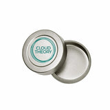 Cloud Theory cleaning tin, open with lid beside it